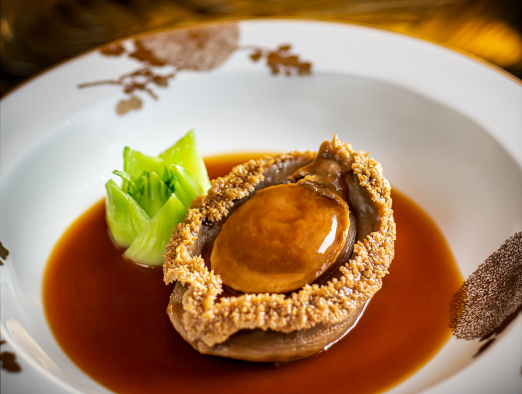 A Premium Aged Abalone braised with Supreme Oyster Sauce that provided by Palace Garden, the Cantonese fine dining restaurant.