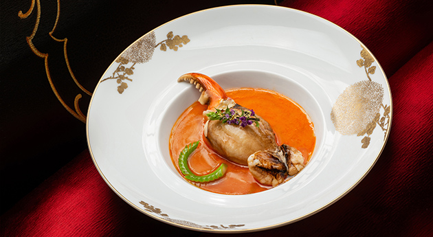 A Whole Fresh Crab Claw served with steamed Lobster Broth Egg White