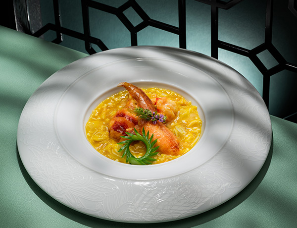French Blue Lobster served with Egg White Caviar in Pumpkin Sauce
