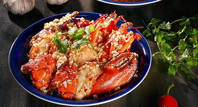 Cook-to-order live seafood, like lobster that is flavoured with spice salt, provided by The Grand Buffet in GLP Resort Macau.